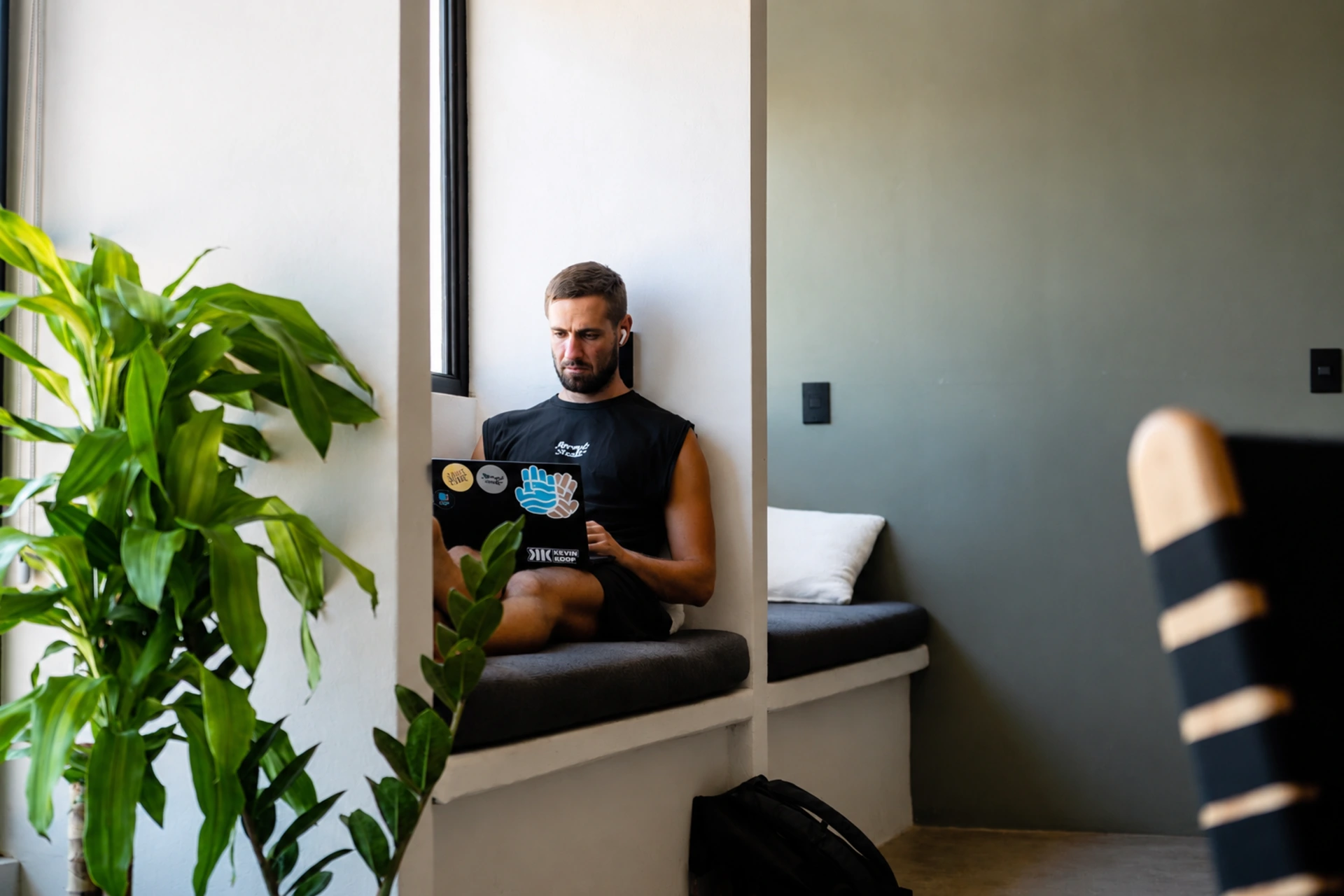 Remote worker using a laptop in a quiet workspace at ESC Village coworking space in Popoyo, Nicaragua